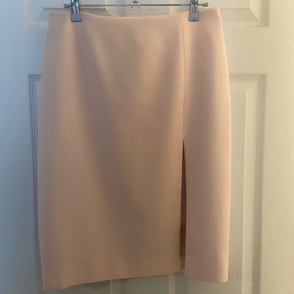 White House Black Market light pink skirt.24 inches in length.